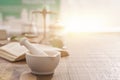 Mortar and pestle on the pharmacist`s table Royalty Free Stock Photo