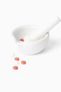 Mortar and pestle with pills Royalty Free Stock Photo