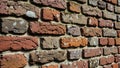 Mortar is visible between the bricks highlighting their varied alignment Royalty Free Stock Photo