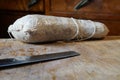 Mortara 04/05/2019: goose salami on a wooden cutting board Royalty Free Stock Photo