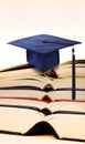 Mortarboard on books Royalty Free Stock Photo
