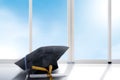 Mortarboard hat and diploma on the table with window glass and blue sky background Royalty Free Stock Photo