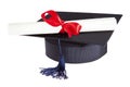 Mortarboard and parchment certificate Royalty Free Stock Photo