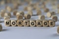 Mortgage - cube with letters, sign with wooden cubes Royalty Free Stock Photo