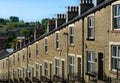 Mortgage and finance housing stock concept. A typical row of Lancashire town stone facade built and slate roof covered terraced ho Royalty Free Stock Photo