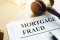 Mortgage fraud evidences on a desk. Royalty Free Stock Photo