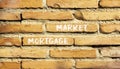 Mortgage market symbol. Concept words Mortgage market on beautiful brown brick wall. Beautiful brown brick wall background.