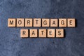 `Mortgage Rates` spelled out in wooden letter tiles