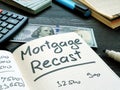 Mortgage recast reminder on the notepad. Royalty Free Stock Photo