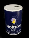 Morton Salt Container on a Black Backdrop Royalty Free Stock Photo