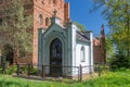 Mortuary chapel with inscription in german language I am a guest on earth. Old chapel in Steblewo, Poland