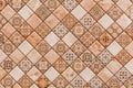 Mosaic brown ceramic floor tiles with abstract pattern texture background Royalty Free Stock Photo