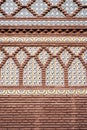 Mosaic on a building with a brick wall in the Spanish Village in Barcelona. Royalty Free Stock Photo