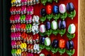 Mosaic of colorful magnets clogs and tulips of Holland for sale, Amsterdam, The Netherlands