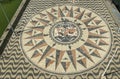 Mosaic compass and world map