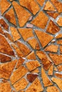 Mosaic of different forms of brown tiles