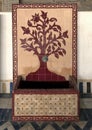 Mosaic fountain with geometric Arabic design on display at Art Naji in Fez, Morocco.