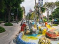 Mosaic fountain with sculptures behind Merlion statue in Sentosa Island, Singapore Royalty Free Stock Photo
