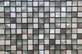 Mosaic of glass and stone in gray and white blue color in the form of small squares. Design backgrounds textures Royalty Free Stock Photo