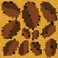 Mosaic of ovals of different sizes on a yellow background. Abstract bitmap of yellow, brown and dark brown colors