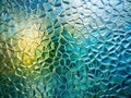 Mosaic pattern featuring irregular, interlocking polygonal shapes in various shades of blue and green. Royalty Free Stock Photo