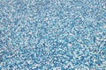 Blue mosaic old dirty tiles of an empty swimming pool. Royalty Free Stock Photo