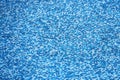 Blue mosaic old dirty tiles of an empty swimming pool. Royalty Free Stock Photo