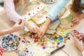 Mosaic puzzle art for kids, children`s creative game. two sisters are playing mosaic Royalty Free Stock Photo