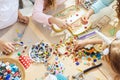 Mosaic puzzle art for kids, children`s creative game. two sisters are playing mosaic Royalty Free Stock Photo