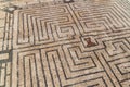 Mosaic representing the labyrinth with the Minotaur in Conimbriga Roman ruins, Portug