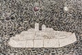 Mosaic of Saint-Paul-de-Vence on pebble pavement