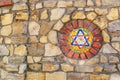 Mosaic star of David on stone wall