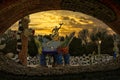 Mosaic statues of animals in Queen Cailfias magical circle in Escondido viewed through an opening