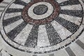 Mosaic stone floor in a circular pattern