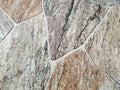 Mosaic of stone rocks looking like natural ones made into brick tiles for modern surface coverage of ground and wall for interior Royalty Free Stock Photo