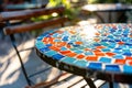 Mosaic table top glimmering in the sunlight