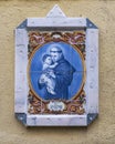 Mosaic tile mural of Saint Anthony of Padua on an outside wall in Alfama, Lisbon`s oldest neighborhood.