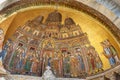 Mosaic of the translation of the body of Saint Mark on facade of Basilica of San Marco. Venice. Italy Royalty Free Stock Photo