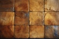 Mosaic wallpaper with square stone tiles in shades of brown Royalty Free Stock Photo