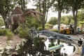 A mosasaur in the foreground and another dinosaur in the background from Aalborg Zoo