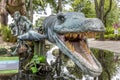 A mosasaur with an open mouth, large yellow teeth from Aalborg Zoo