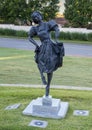 Moscelyne Larkin by Gary Henson and Monte England outside the Tulsa Historical Center and Museum.