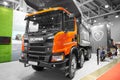 MOSCOW, APR, 18, 2018: Close up diagonal view on Scania G440 XT tipper truck logo on hood radiator. Swedish car logotype. SpecialM