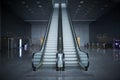 Perspective view on metal escalator moving stairs to the second floor in exhibition hall Crocus Expo. Staircase in office business Royalty Free Stock Photo