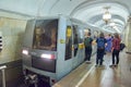 MOSCOW, AUG, 22, 2017: Modern subway passenger train at metro station and train waiting people on railway station ptatform. Perspe