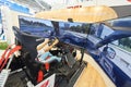 MOSCOW, AUG. 22, 2017: View on exhibition stand with 3d car driving simulator with wide led screens, electronic hydraulic tilting