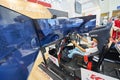 MOSCOW, AUG. 22, 2017: View on exhibition stand with 3d car driving simulator with wide led screens, electronic hydraulic tilting