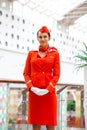 MOSCOW: 01 AUGUST 2019. Beautiful stewardess dressed in official red uniform of Aeroflot Airlines