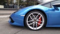 Moscow. Autumn 2018. Bright blue Lamborghini Huracan parked on the street. Car wheels and brakes close up. Side view Royalty Free Stock Photo