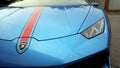 Moscow. Autumn 2018. Bright blue Lamborghini Huracan parked on the street. With red stripe on a car hood. Headlights and front Royalty Free Stock Photo